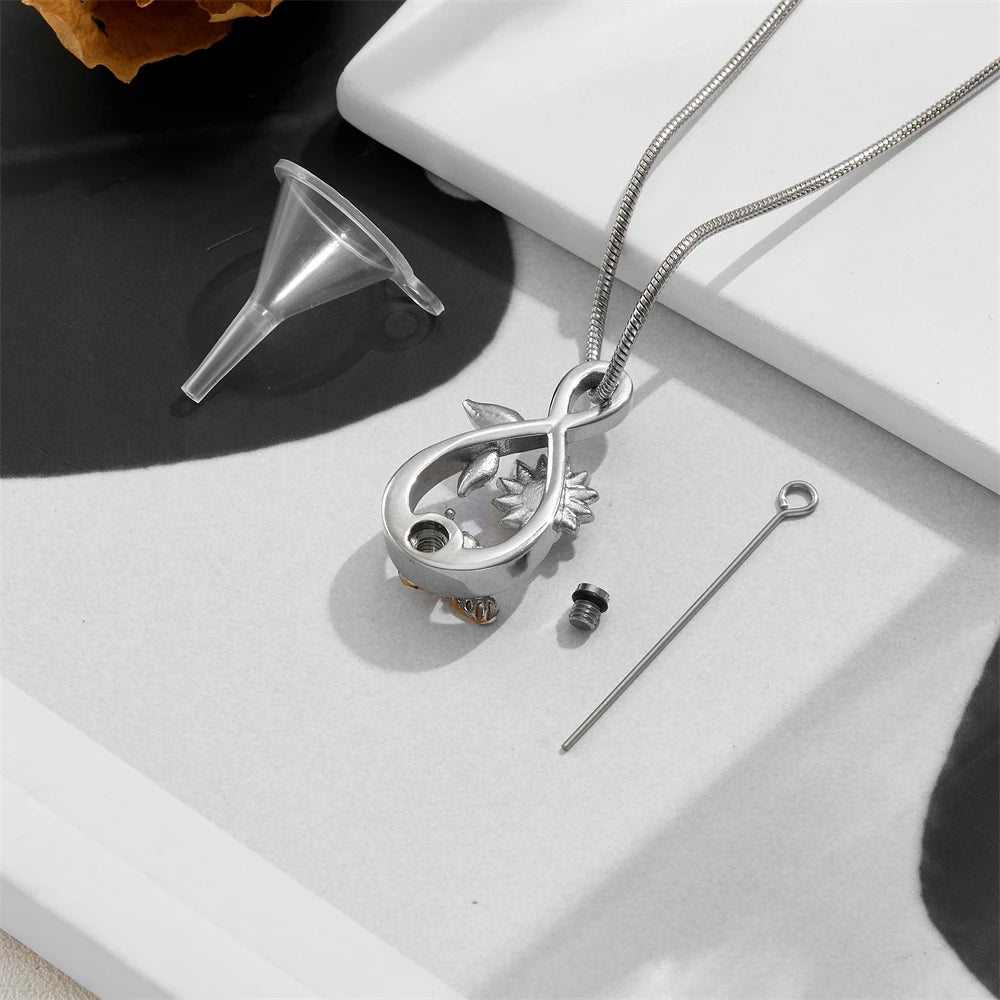 Infinity Symbol Memorial Ash Pendant - Stainless Steel Keepsake for Loved Ones and Pets with Bee and Floral Design